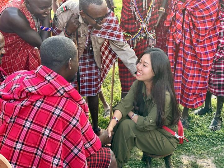 A USANA Foundation visitor greets community members in Kenya